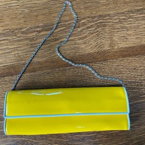Bright yellow clutch with chain